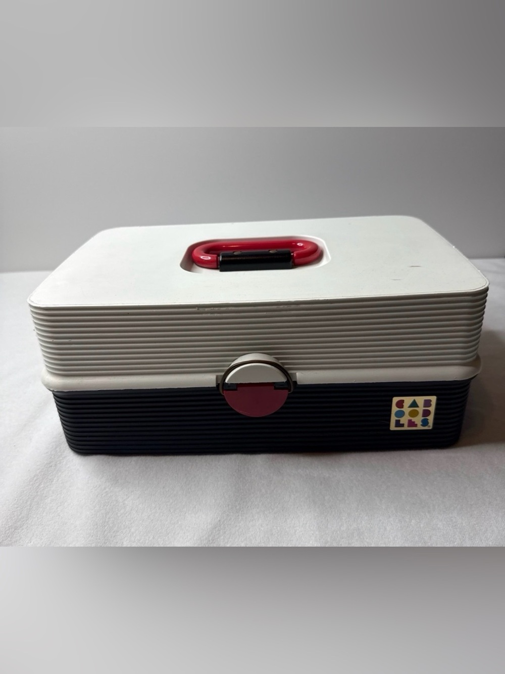Retro Plastic Storage Case with Red Accent